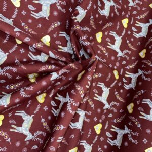 Algodón motivos navideños granate