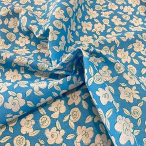 Algodón 100% estampado flores color crema